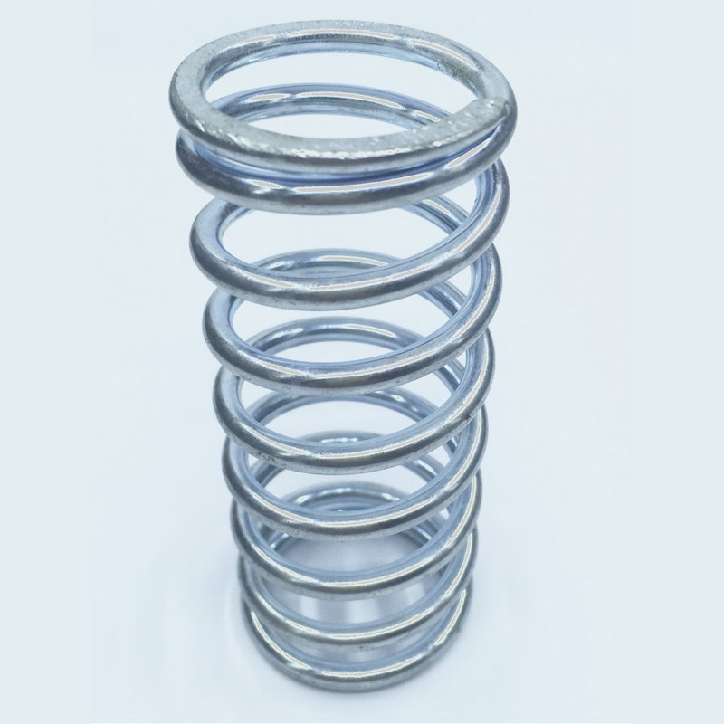 Vankkarakenteinen puristusjousi